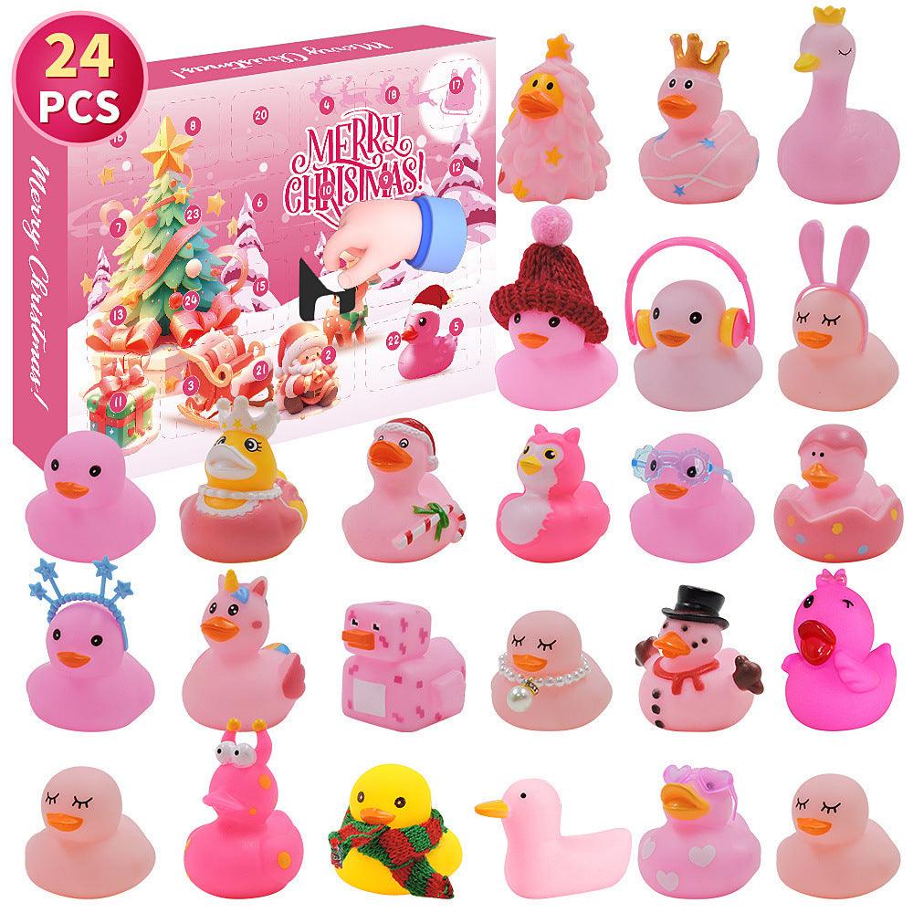 Okie Soft Play’s Rubber Duck Advent Calendar – 24 Christmas Ducks features twenty-four uniquely decorated pink ducks in festive costumes, neatly arranged in four rows. The holiday set comes with a cheerful box adorned with Christmas graphics and “Merry Christmas!” text, creating a delightful advent calendar experience for the season.