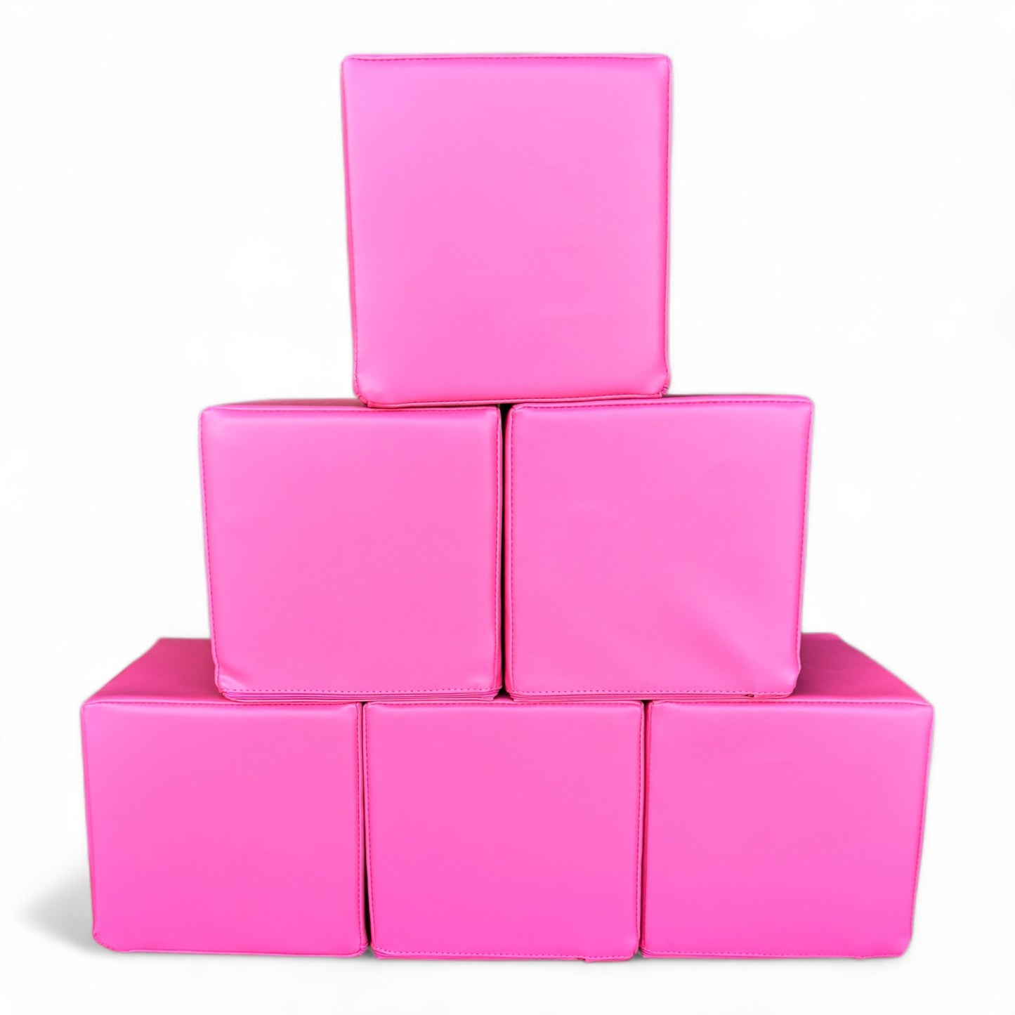 Stack of six hot pink soft play blocks arranged in a pyramid, CPSC certified foam cubes for kids