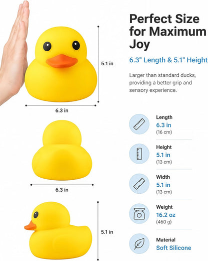 A hand next to the Giant Yellow Duck Squishy from Okie Soft Play, highlighting its impressive size (6.3″ long, 5.1″ high, 5.1″ wide) compared to standard rubber ducks. Made from soft TPR silicone with a touch of orange detail and filled with flour for extra squishiness, this stress relief toy weighs 16.2 oz—substantially heftier and more satisfying to squeeze than regular ducks.
