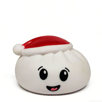 The Okie Soft Play Christmas Bun Squeaky Toy – Cute Holiday Stocking Stuffer features a round, smiling dumpling with a red and white Santa hat, set against a plain white background.