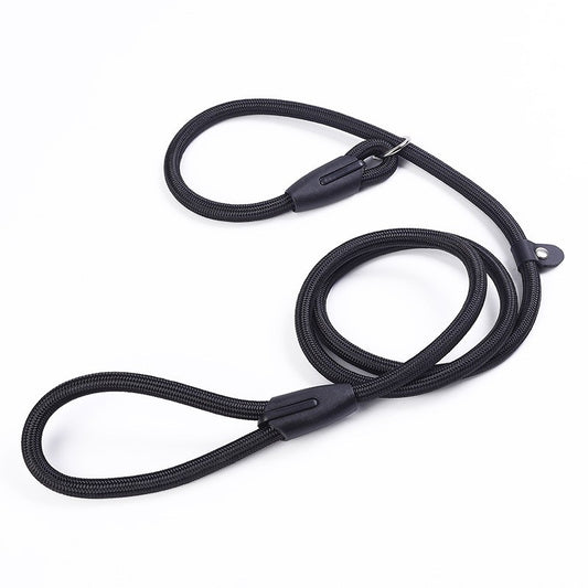 The OkiePaw 10mm Nylon Rope Slip Lead – 51 Inch from Okie Soft Play Store is shown coiled into loose loops on a white background; it features a black nylon bungee cord design with plastic hooks at both ends.