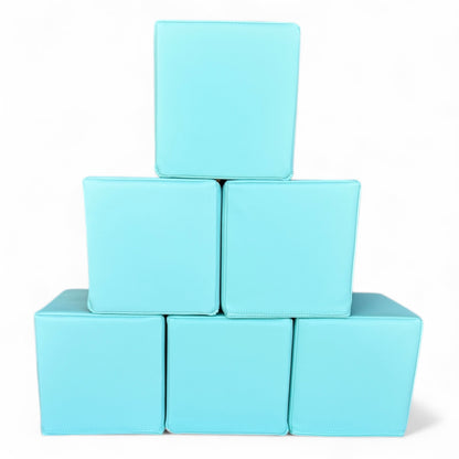 Stack of six light blue soft play blocks arranged in a pyramid, CPSC certified foam cubes for kids