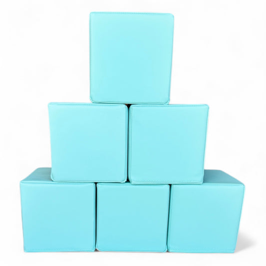 Stack of six light blue soft play blocks arranged in a pyramid, CPSC certified foam cubes for kids