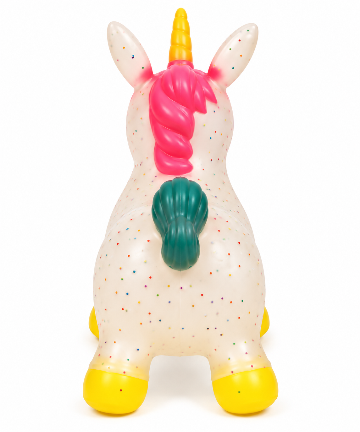 The Bouncy Hopper Unicorn for Toddlers by Okie Soft Play Store is viewed from behind against a white background, showcasing its white body covered in small colorful spots, yellow horn, pink mane, green tail, and yellow hooves—perfect as a whimsical children’s toy or inflatable ride-on bounce animal.