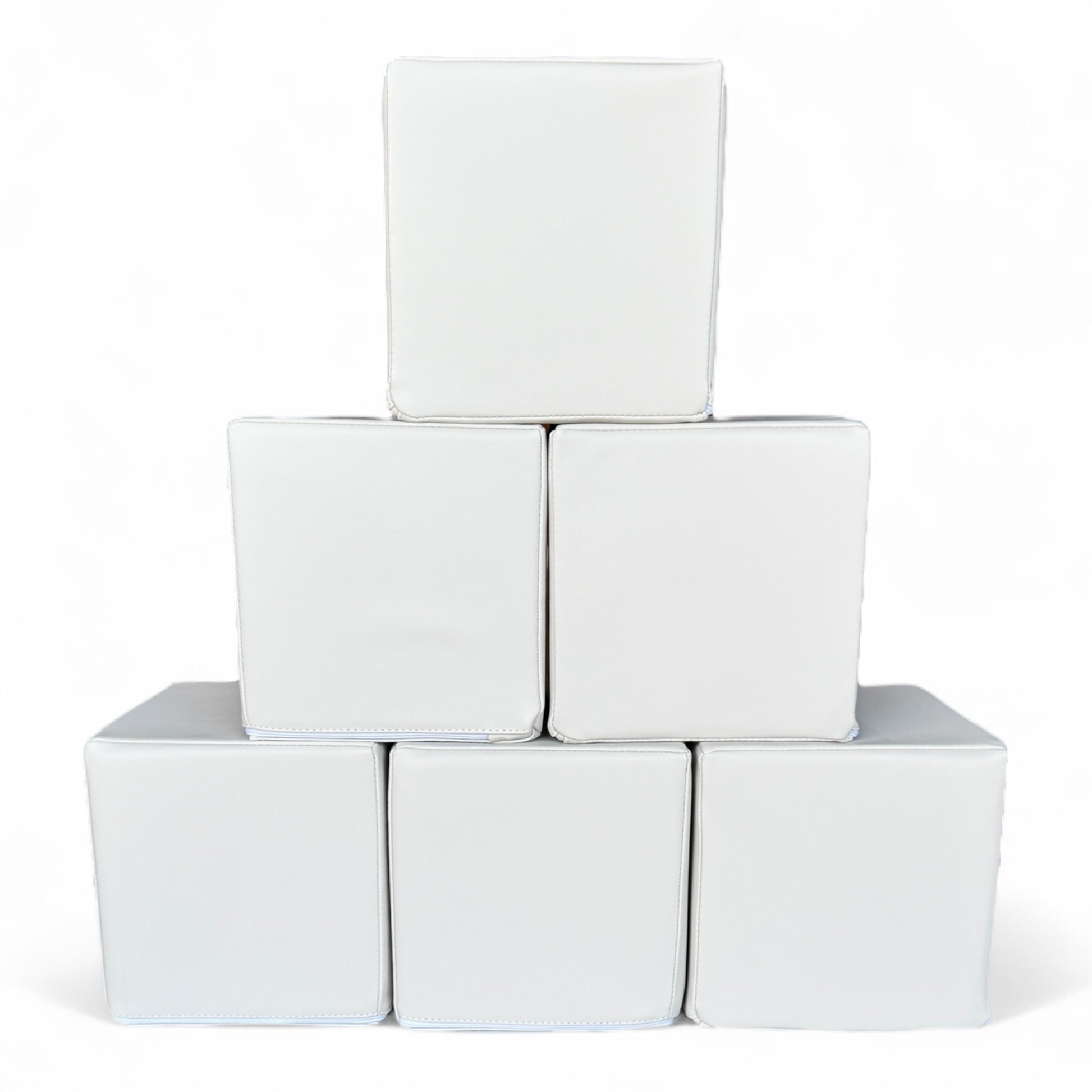 Stack of six white soft play blocks arranged in a pyramid, CPSC certified foam cubes for kids - Front